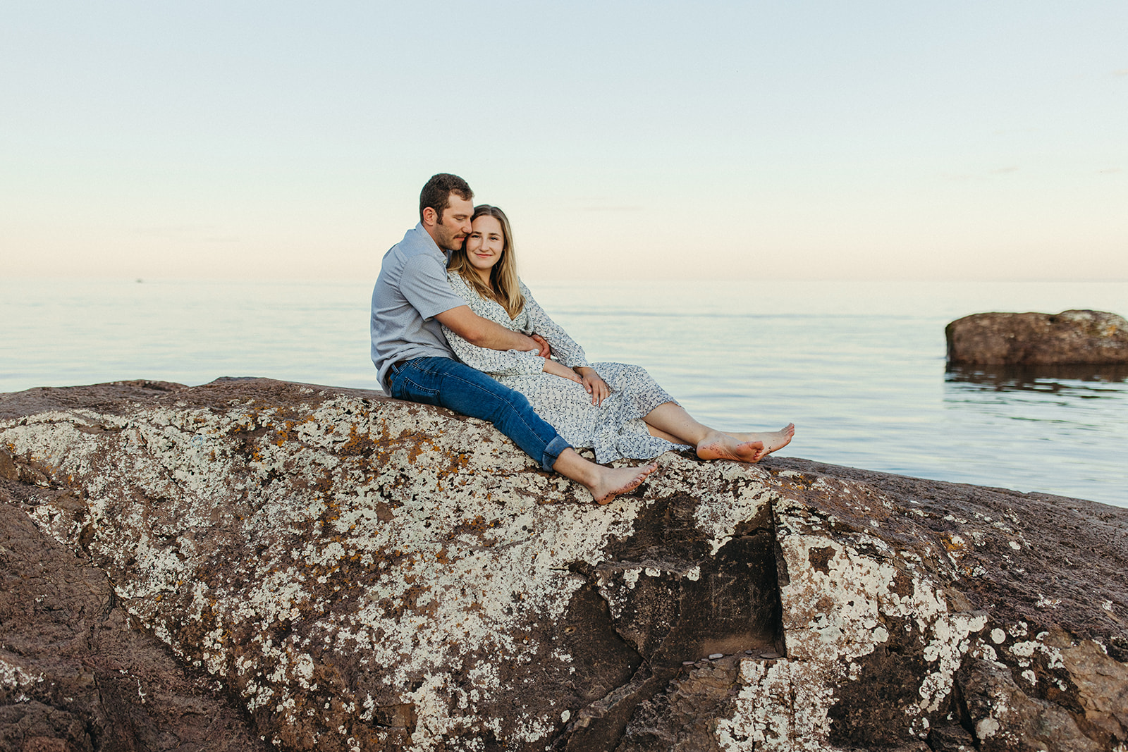 Couple newly engaged gets their photos taken at Lester Park in Duluth, Minnesota.